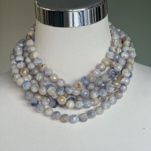 layered light blue beaded statement necklace